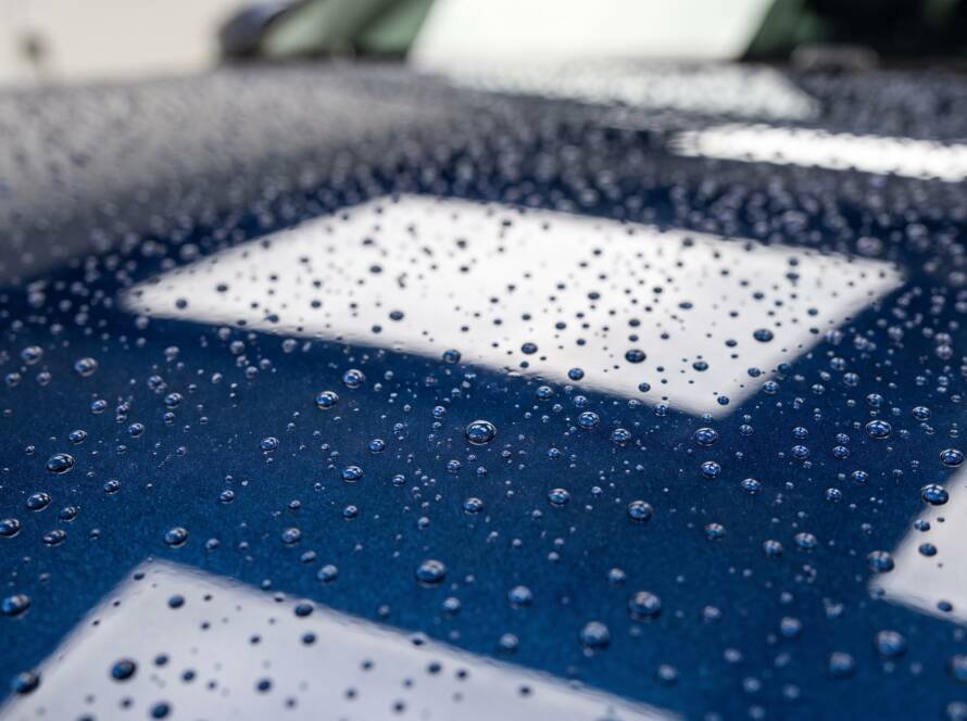 Water beading tightly on a ceramic coated car hood at MDM Auto Detail Richmond Hill
